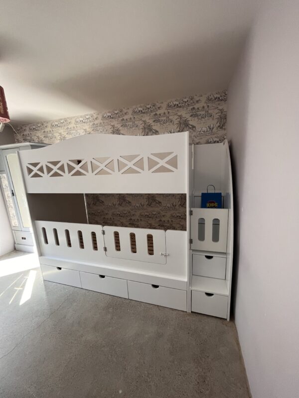 Bunk with stairs and safety gates for young children